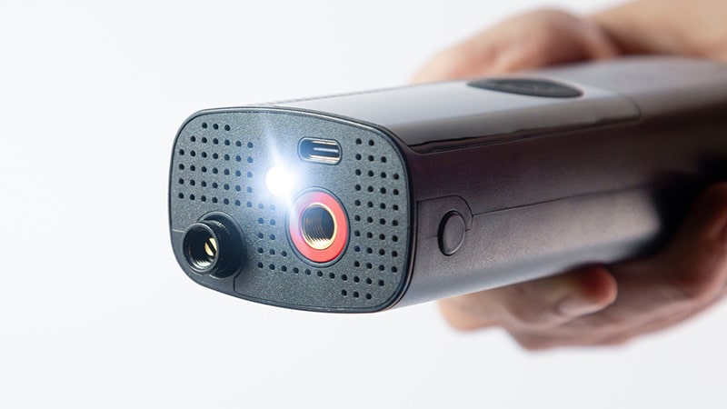 Airmoto tire inflator with its built-in LED light switched on