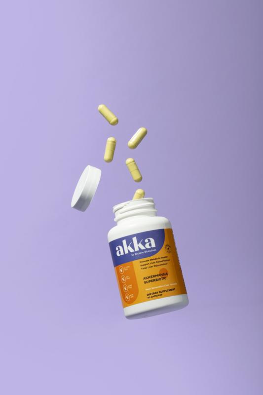 Akka Akkermansia Superbiotic bottle with capsules spilling out