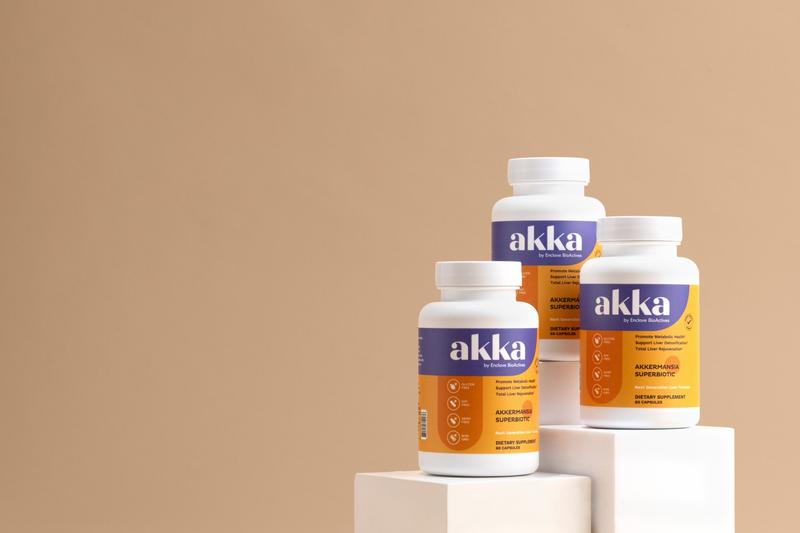 Three bottles of Akka Akkermansia Superbiotic by Enclave BioActives on a display