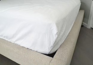 Bed Bunny fitted sheet pulled tight and smooth over a mattress corner