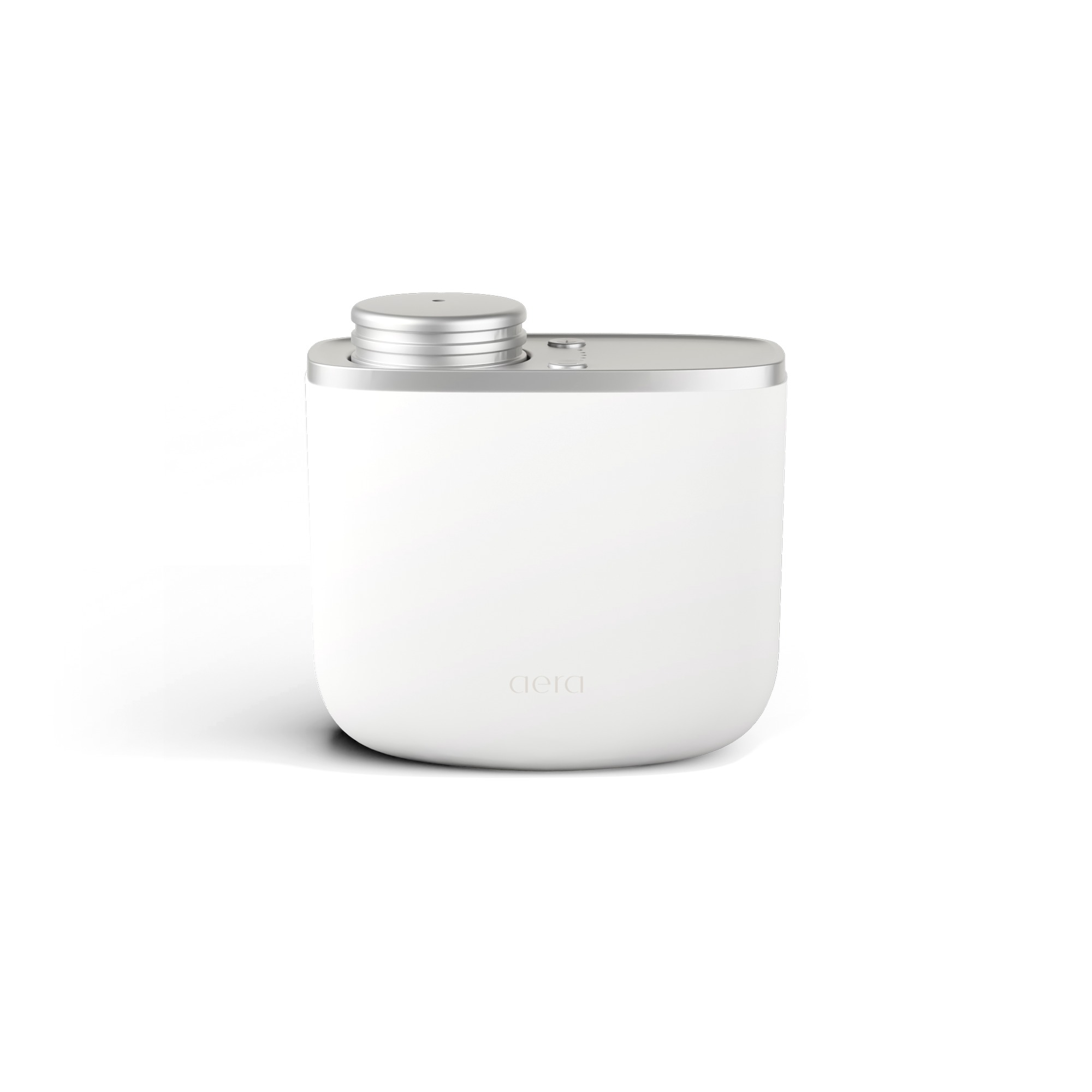 Aera smart home diffuser with a white body and brushed metal cap