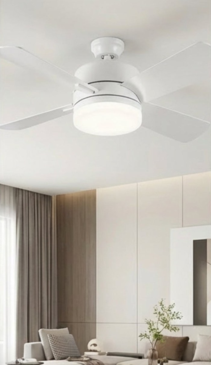 Bell+Howell Socket Breeze screw-in socket fan mounted on a ceiling in a living room
