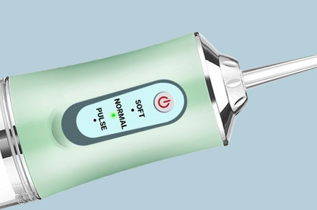 Close-up of the DentaStream water flosser body showing the Soft, Normal, and Pulse mode controls