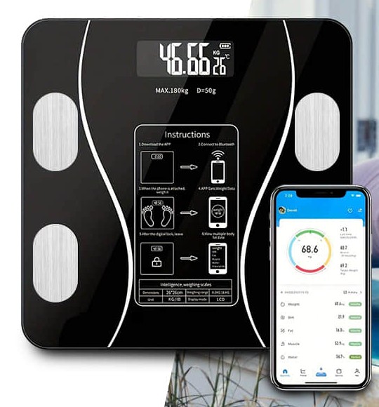 The black glass FitScale X smart scale with its LCD weight display next to a phone showing the app