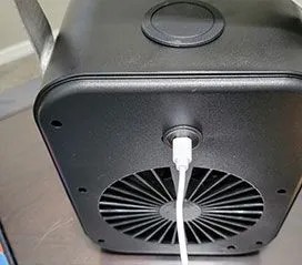Underside of the Glacier Breeze personal cooler showing the USB-C charging port