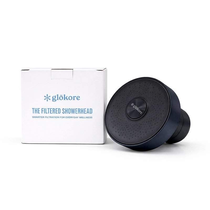 The Glokore Filtered Showerhead next to its retail box reading The Filtered Showerhead