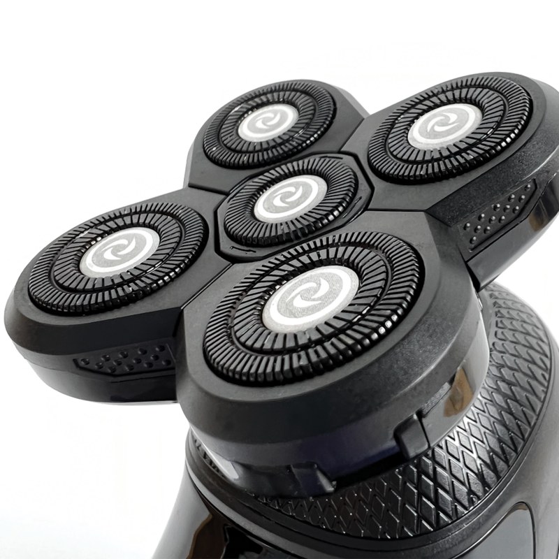 Close-up of the Groomie BaldiePro's five floating rotary shaving heads