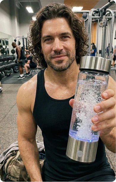 H2Next hydrogen water bottle held at the gym after a workout