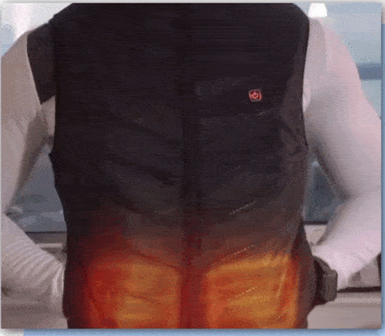 Hilipert heated vest warming up, lower heating zones glowing with the power button illuminated
