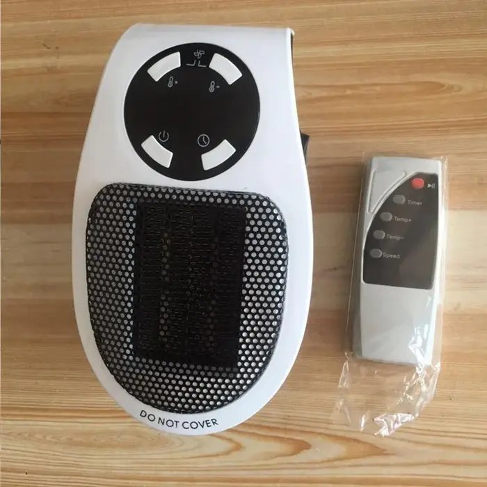 HeatSpace plug-in heater beside its remote control and digital temperature display