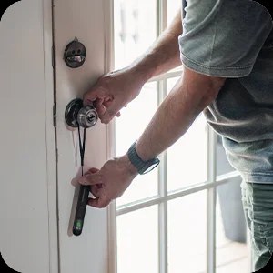 Person using the Hero Privacy Pen to check a hotel room entry for hidden devices
