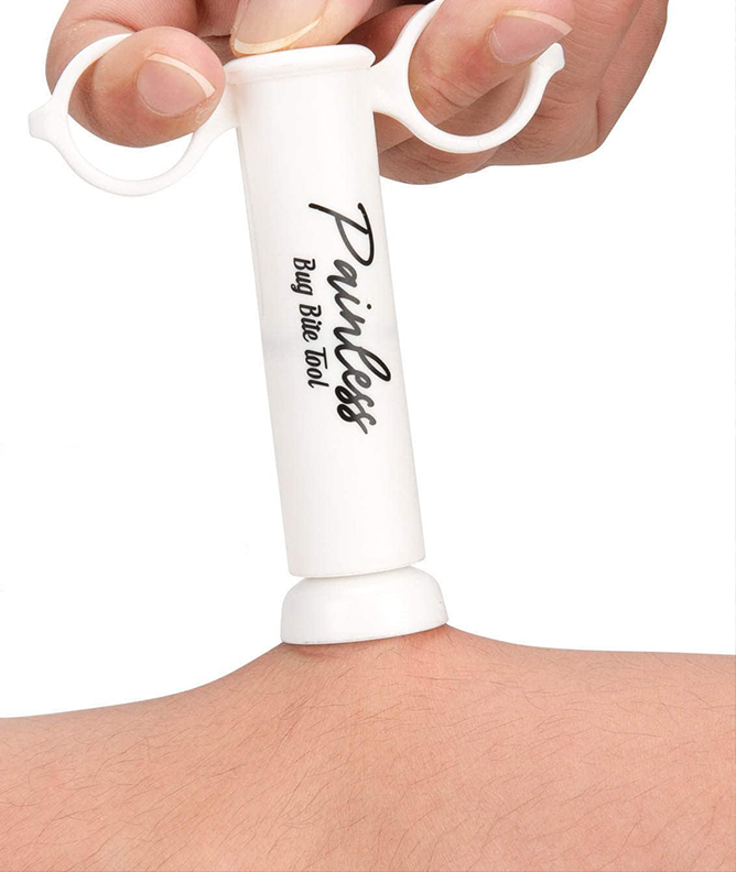 Person pressing the Itch Relief Pro bug bite suction tool against their skin to draw out a bite