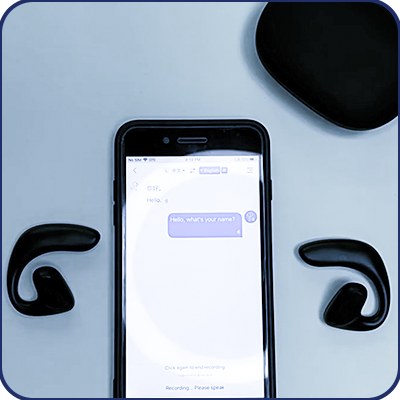Keilini TalkEase translation earbuds beside a phone showing a translated conversation