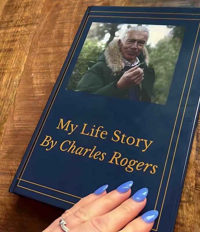 Navy Memorygram 'My Life Story' legacy book on a wooden table