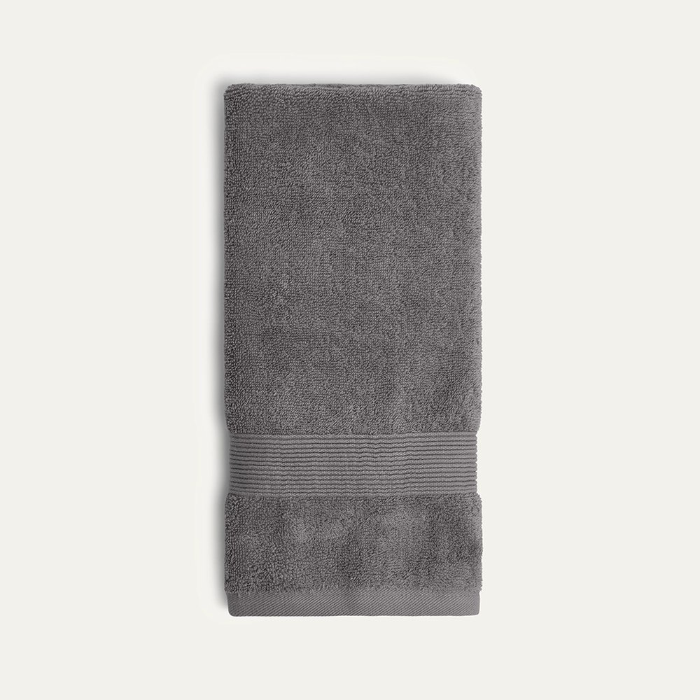 A folded stone-gray Miracle silver-infused hand towel