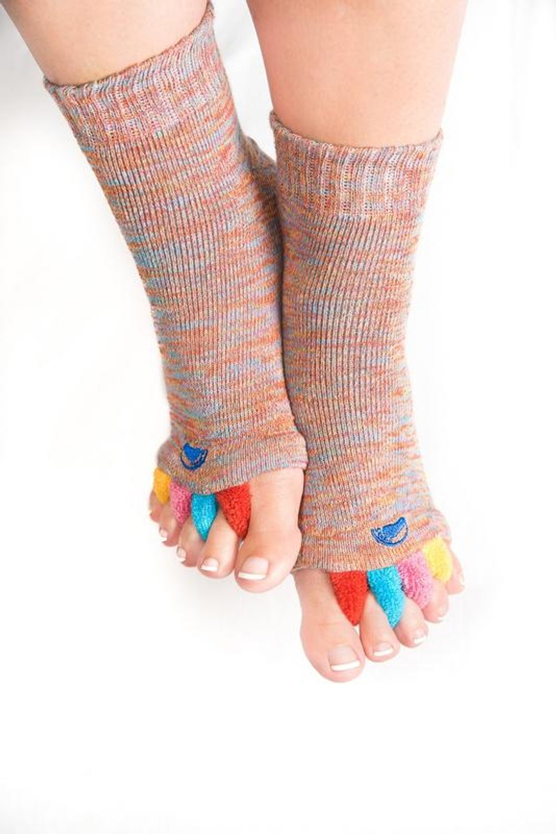 Front view of both feet wearing My Happy Feet foot alignment socks with toe separators