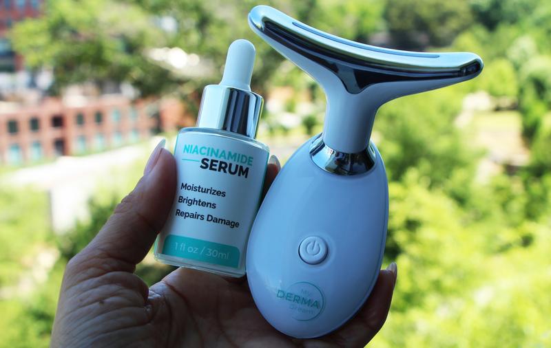 The MyoGlow skin-sculpting wand by My Derma Dream held in one hand