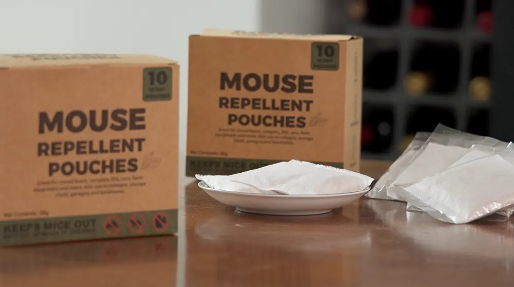 PestVault mouse repellent pouches next to the retail box