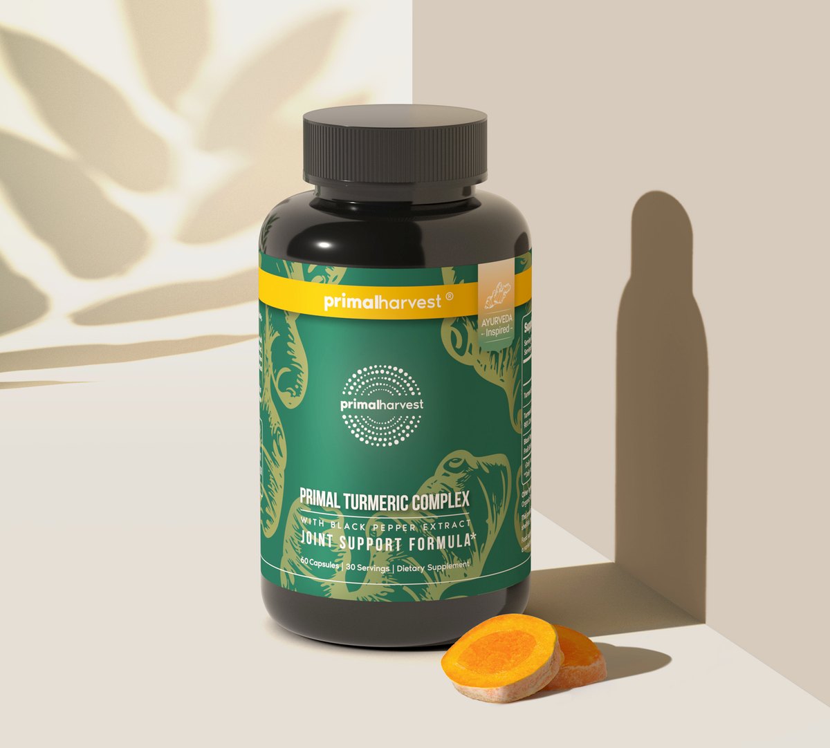 Primal Turmeric Complex bottle beside a sliced turmeric root