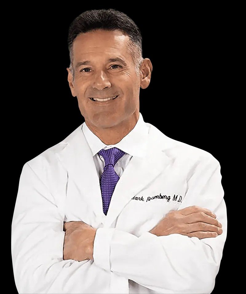 Dr. Mark Rosenberg, M.D., founder of Sun Coast Sciences, in a white coat