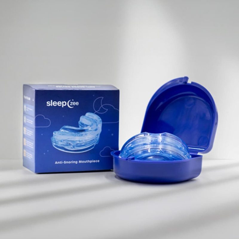 SleepZee anti-snoring mouthpiece with its storage case and retail box