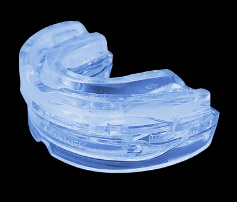 Close-up of the SleepZee anti-snoring mouthpiece showing its molded two-piece design