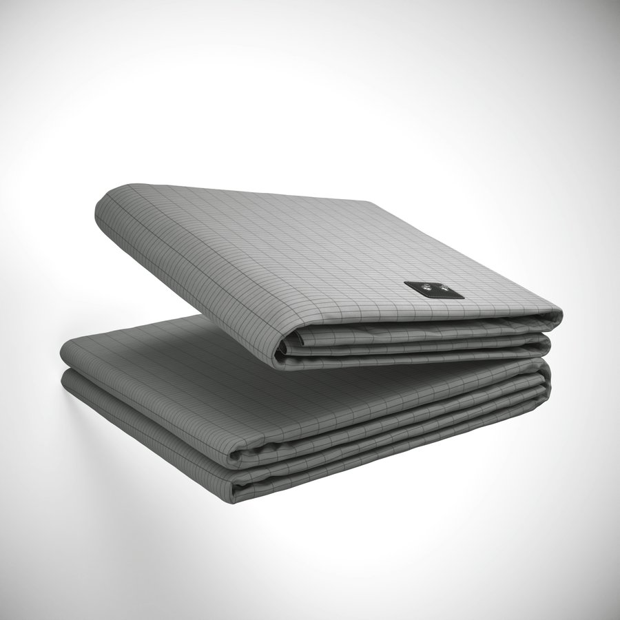 Terra Grounding Bed Sheet folded, showing the conductive silver grid weave and snap connector