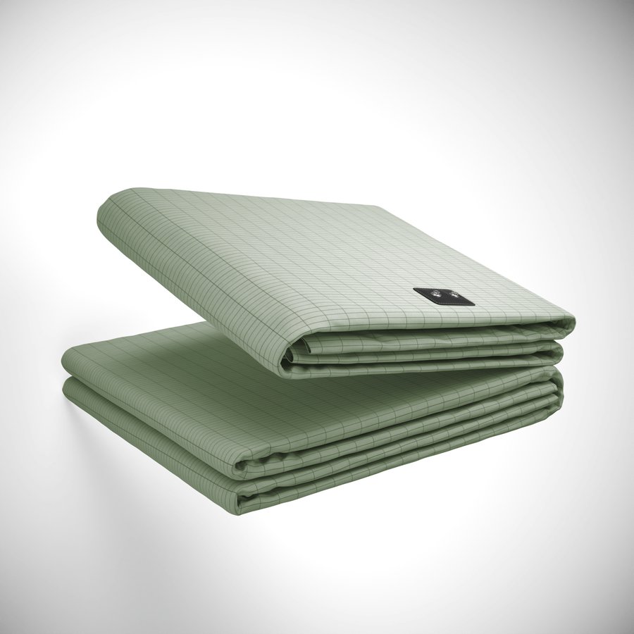 Terra Grounding Bed Sheet folded in the Warm Olive sage colorway