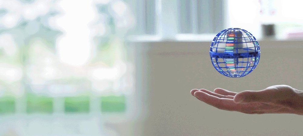Orbi Boomerang Ball flying orb hovering in the air above an open palm