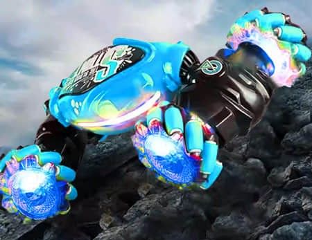 The Orbi RC Car doing a light-up stunt on a pile of rocks