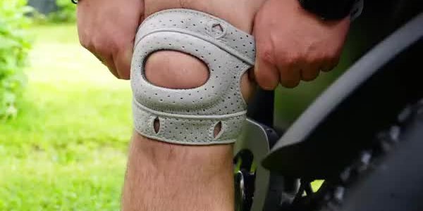 The Wellnee knee brace worn on a knee outdoors during activity