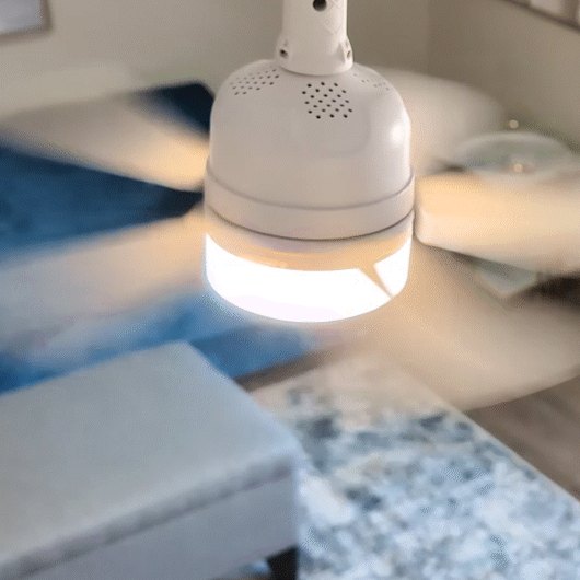 WunderCool light socket fan installed and glowing in a room