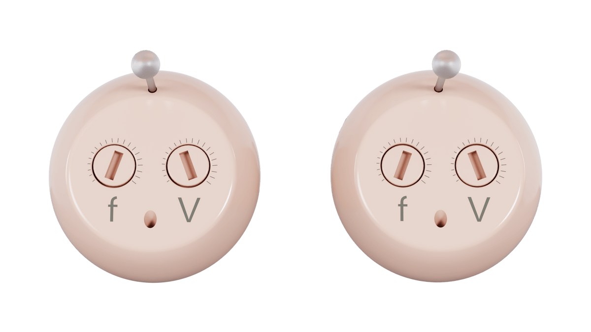 Audien Atom ONE hearing aids showing their frequency and volume adjustment dials