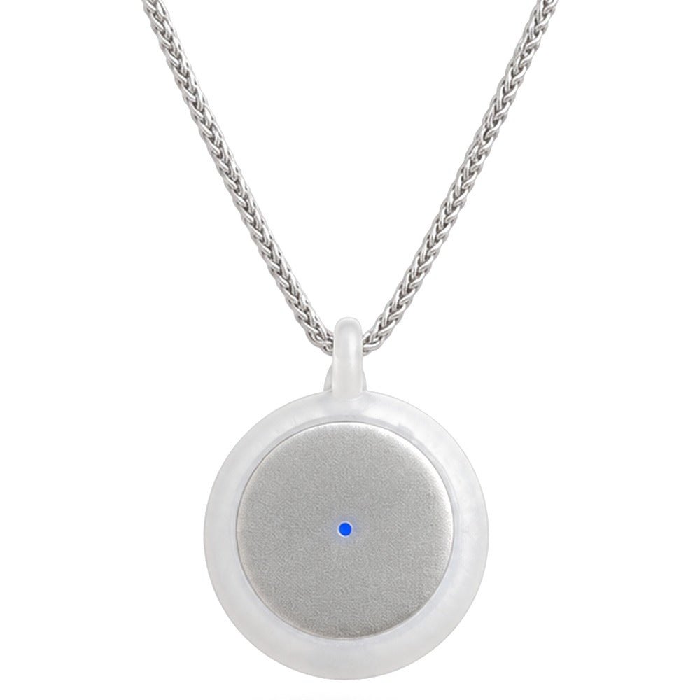 The Omi AI wearable pendant on a chain